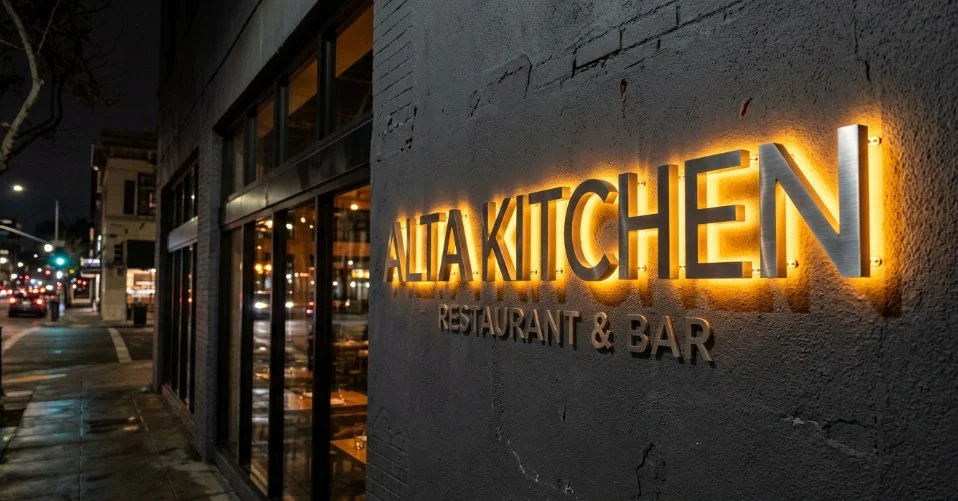 Halo-lit stainless channel letters restaurant bar San Jose street level — Clear Line Signs
