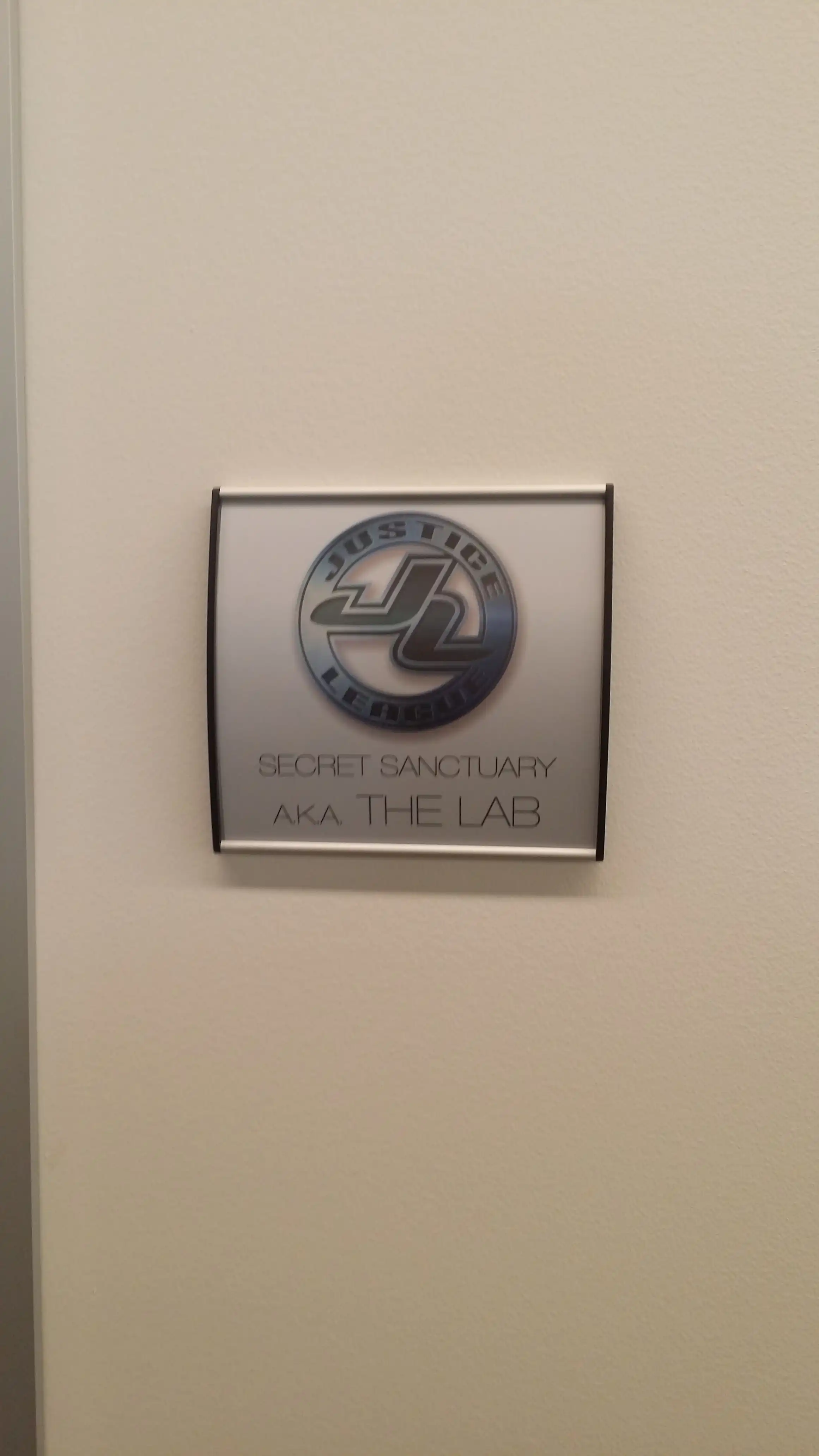 Cohere Technologies office wayfinding sign — room ID frame, San Jose