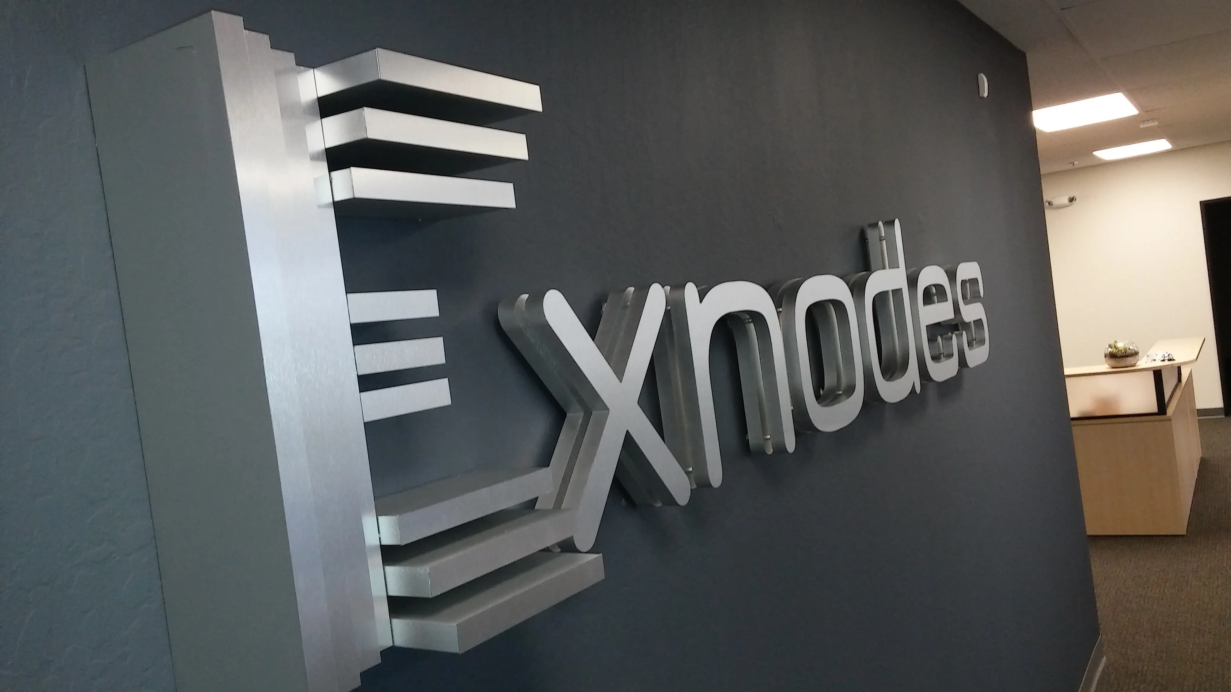 Exnodes layered acrylic lobby sign San Jose — Clear Line Signs