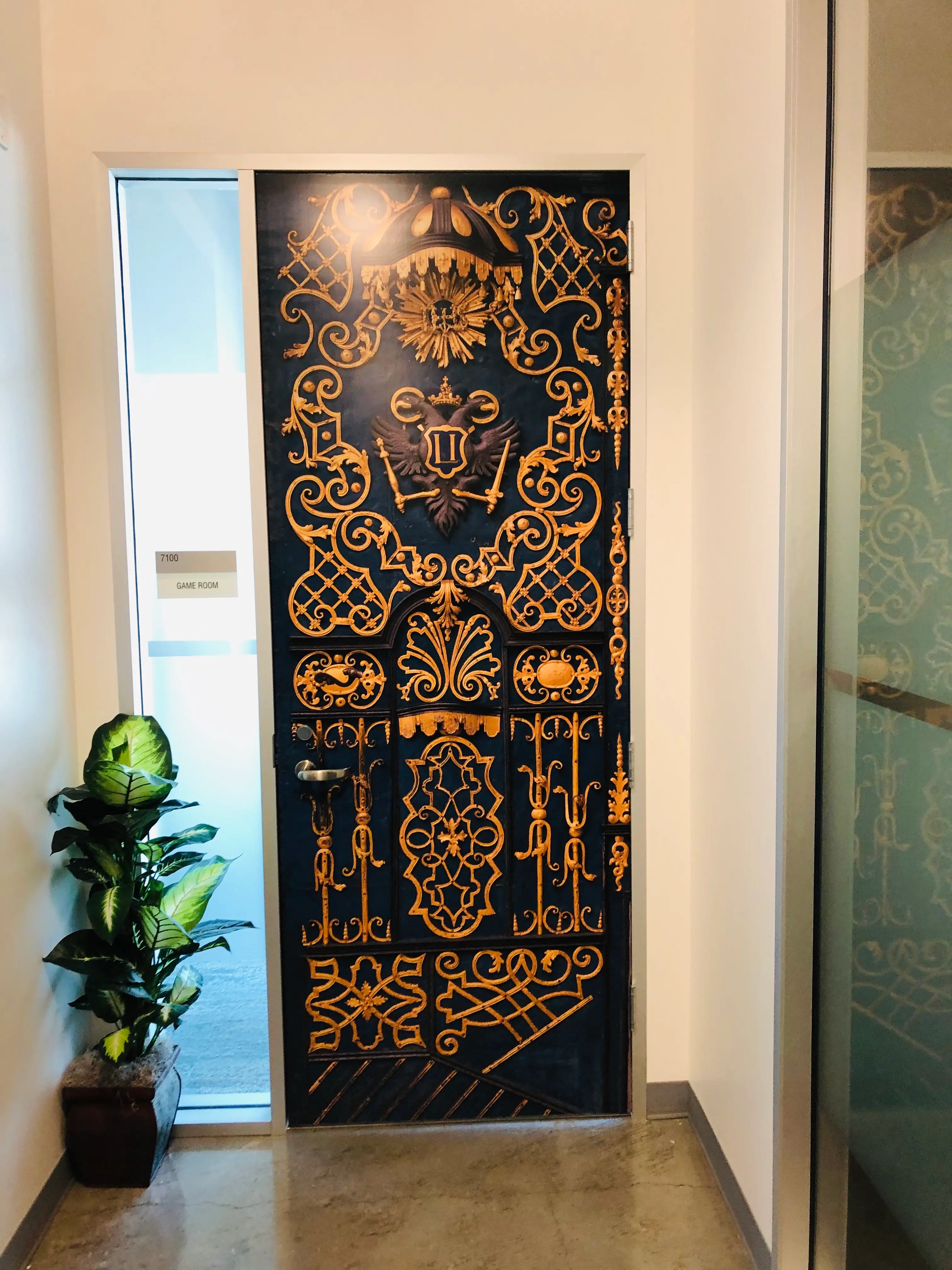 Photorealistic medieval castle door wrap on conference room door Ring Amazon Silicon Valley