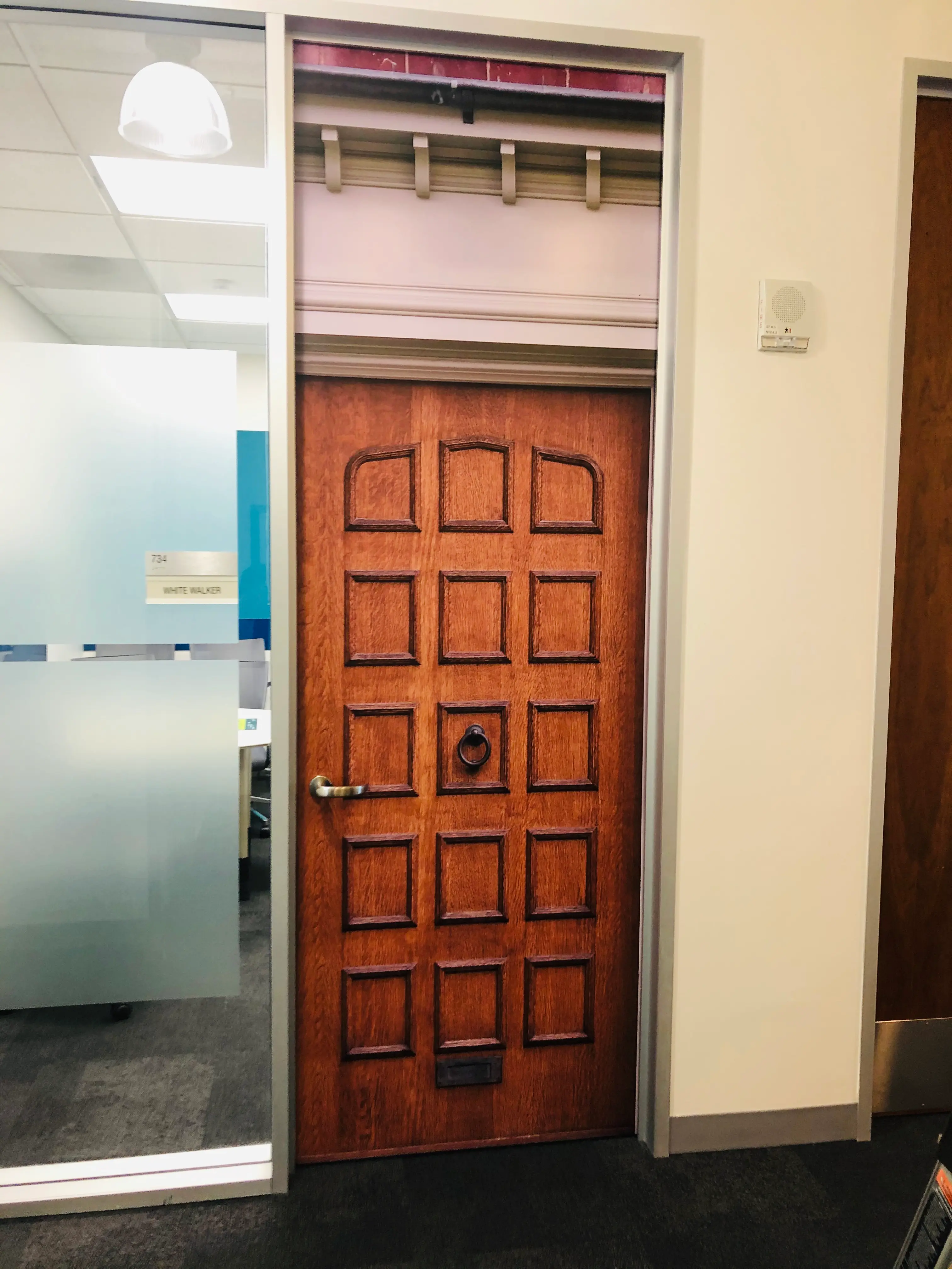 Men's and women's restroom door wraps Georgian style Ring Amazon office Silicon Valley