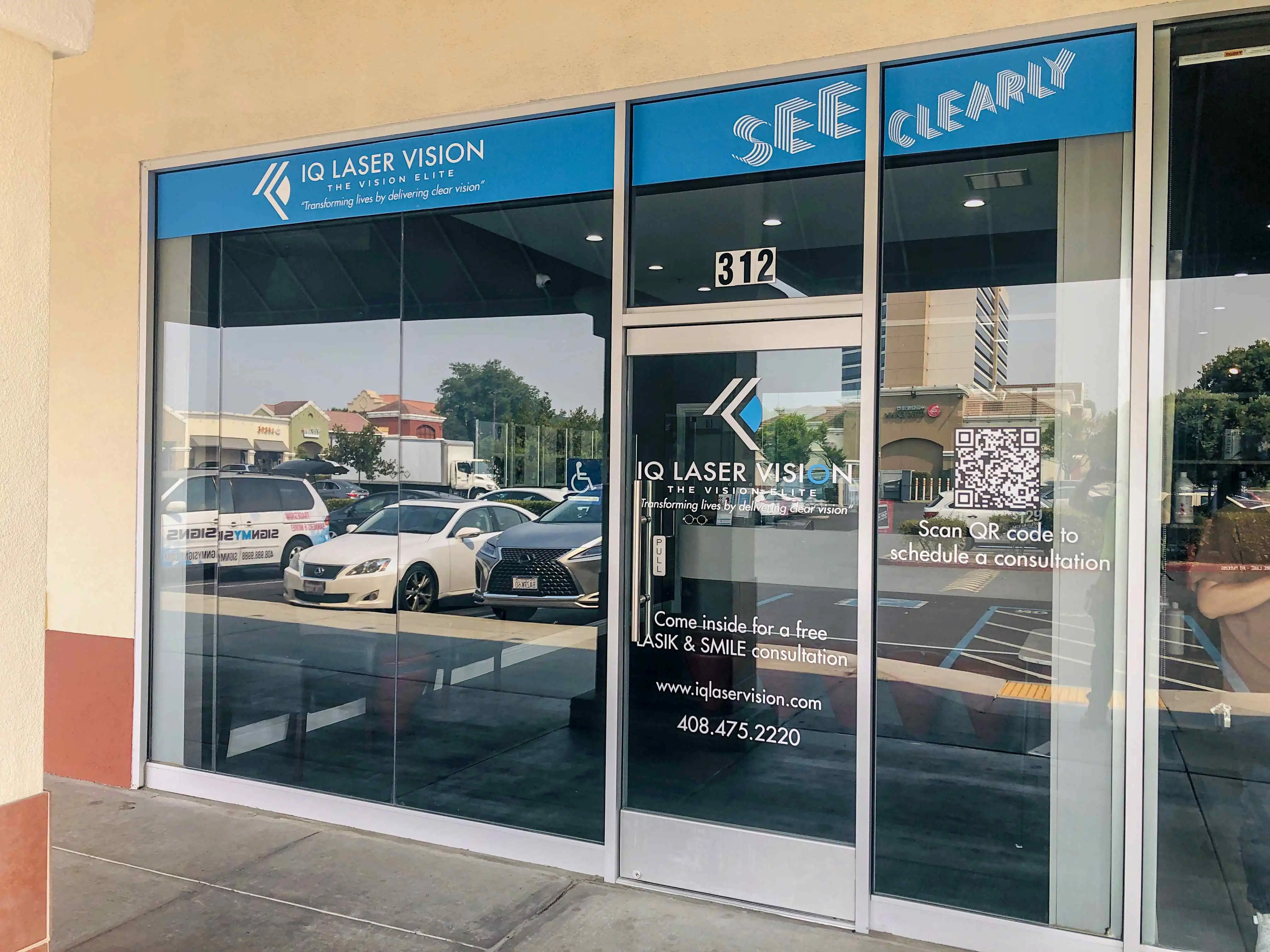 IQ Laser Vision full storefront digital print window wrap San Jose — Clear Line Signs