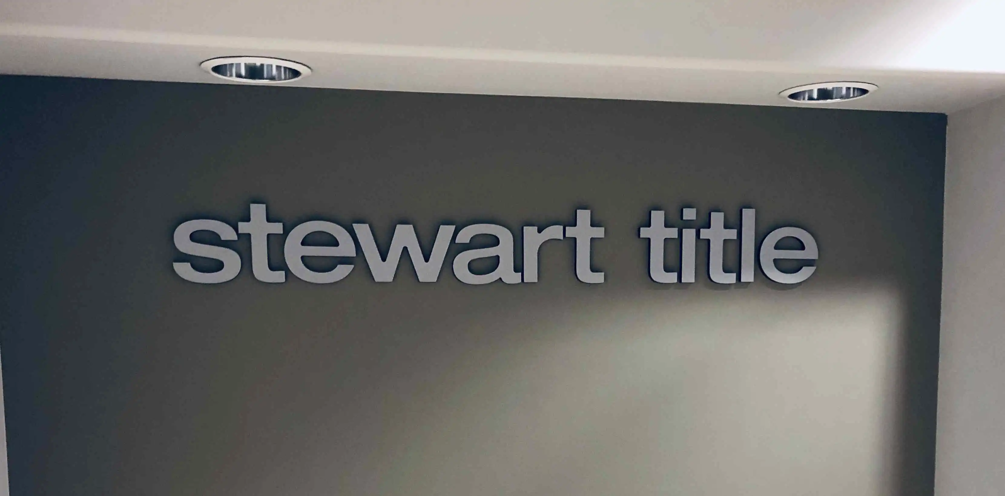 Stewart Title painted acrylic dimensional lobby sign San Jose — Clear Line Signs