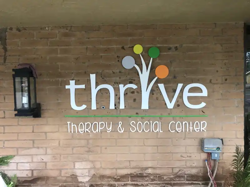 Thrive Therapy exterior dimensional sign brick wall San Jose — Clear Line Signs