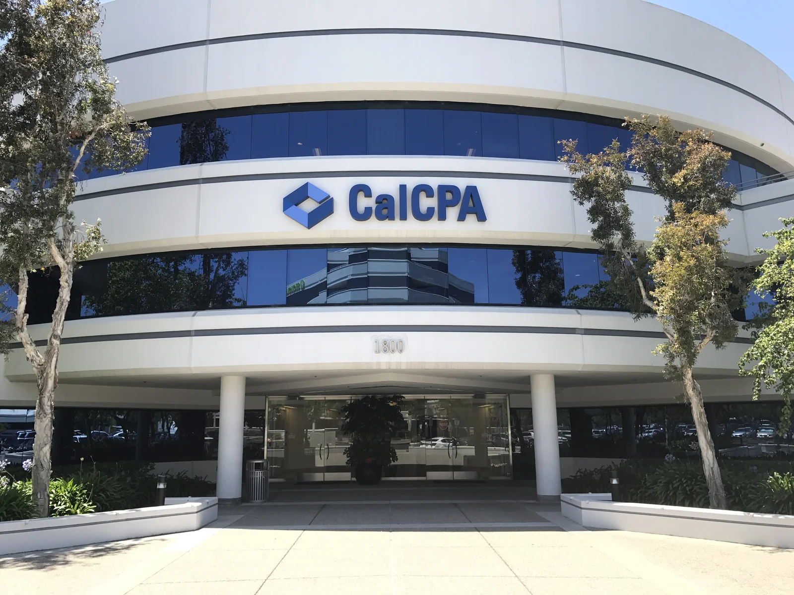 CalCPA painted acrylic dimensional letters on curved corporate building facade Silicon Valley