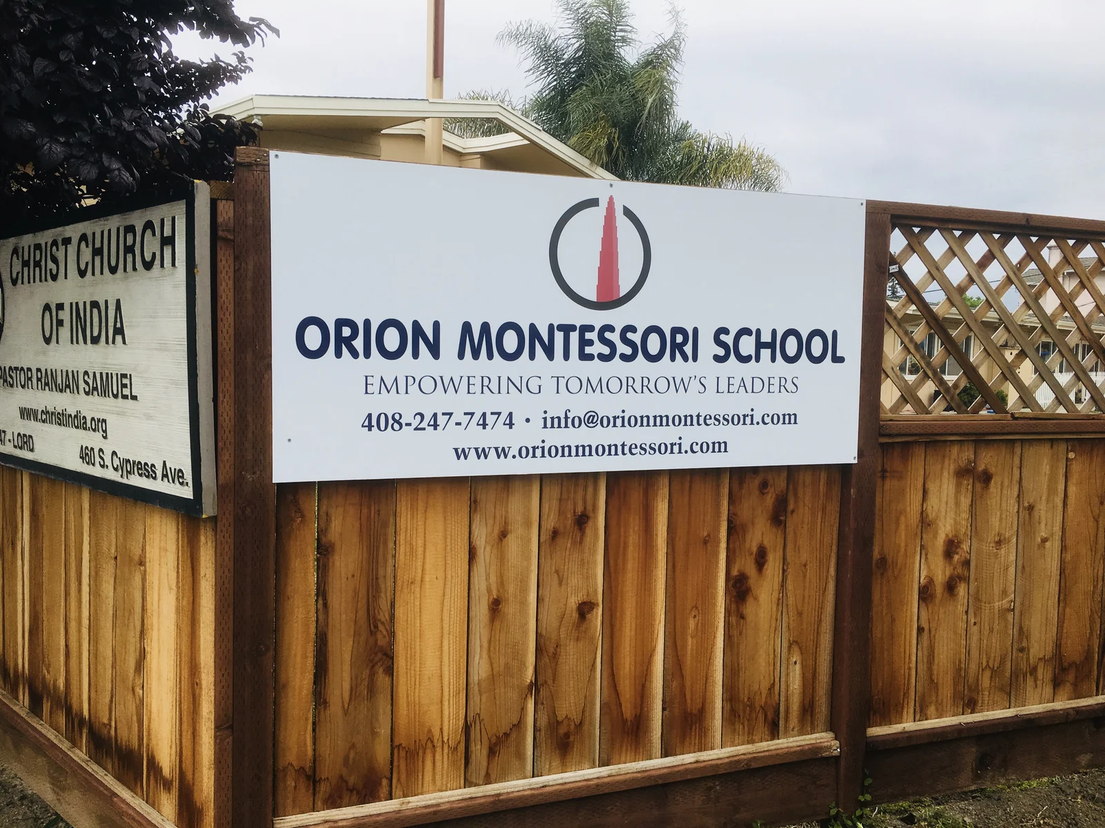 Orion Montessori School printed vinyl dibond sign on wood fence San Jose