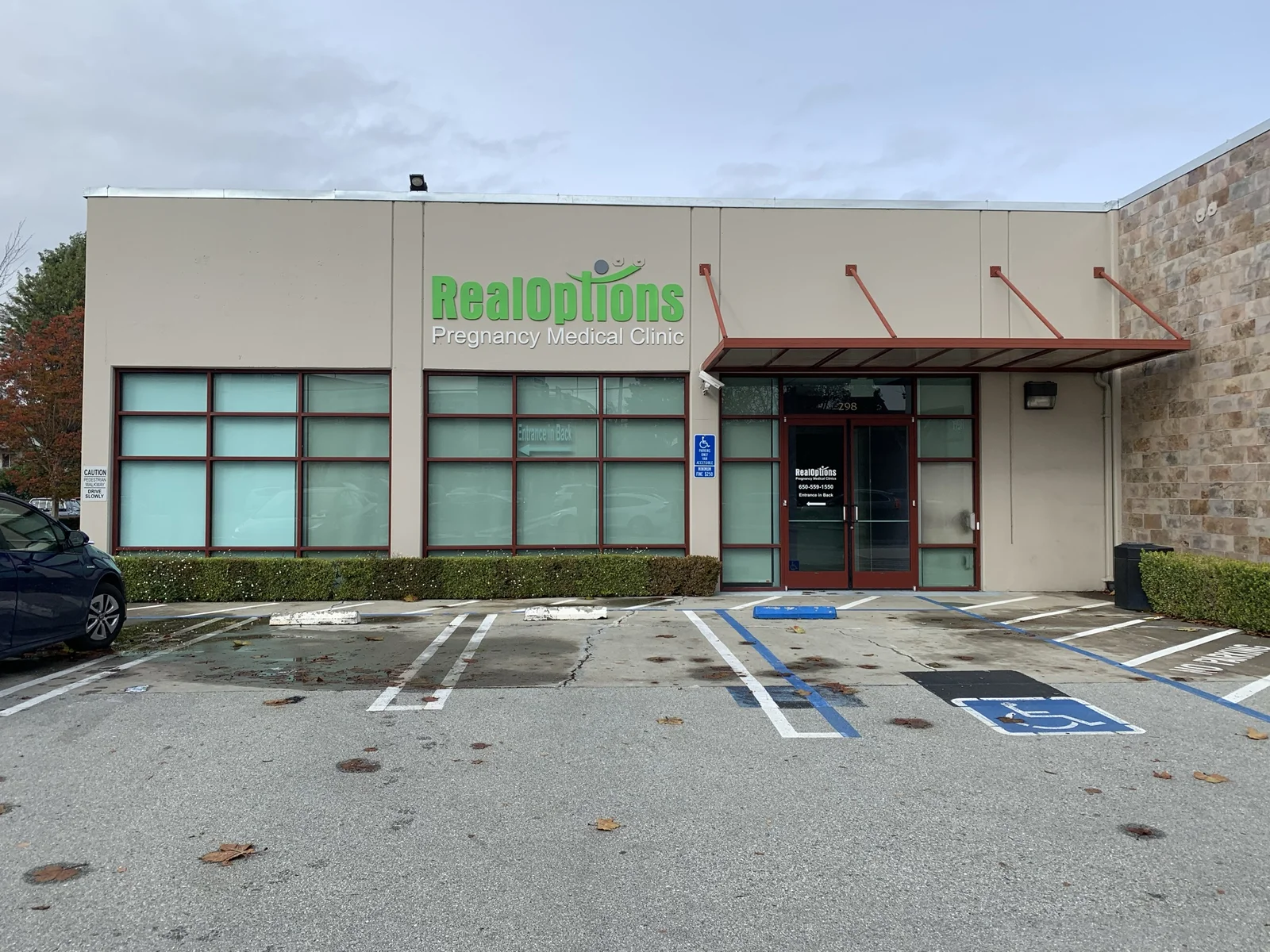 RealOptions Pregnancy Medical Clinic painted acrylic building sign Silicon Valley