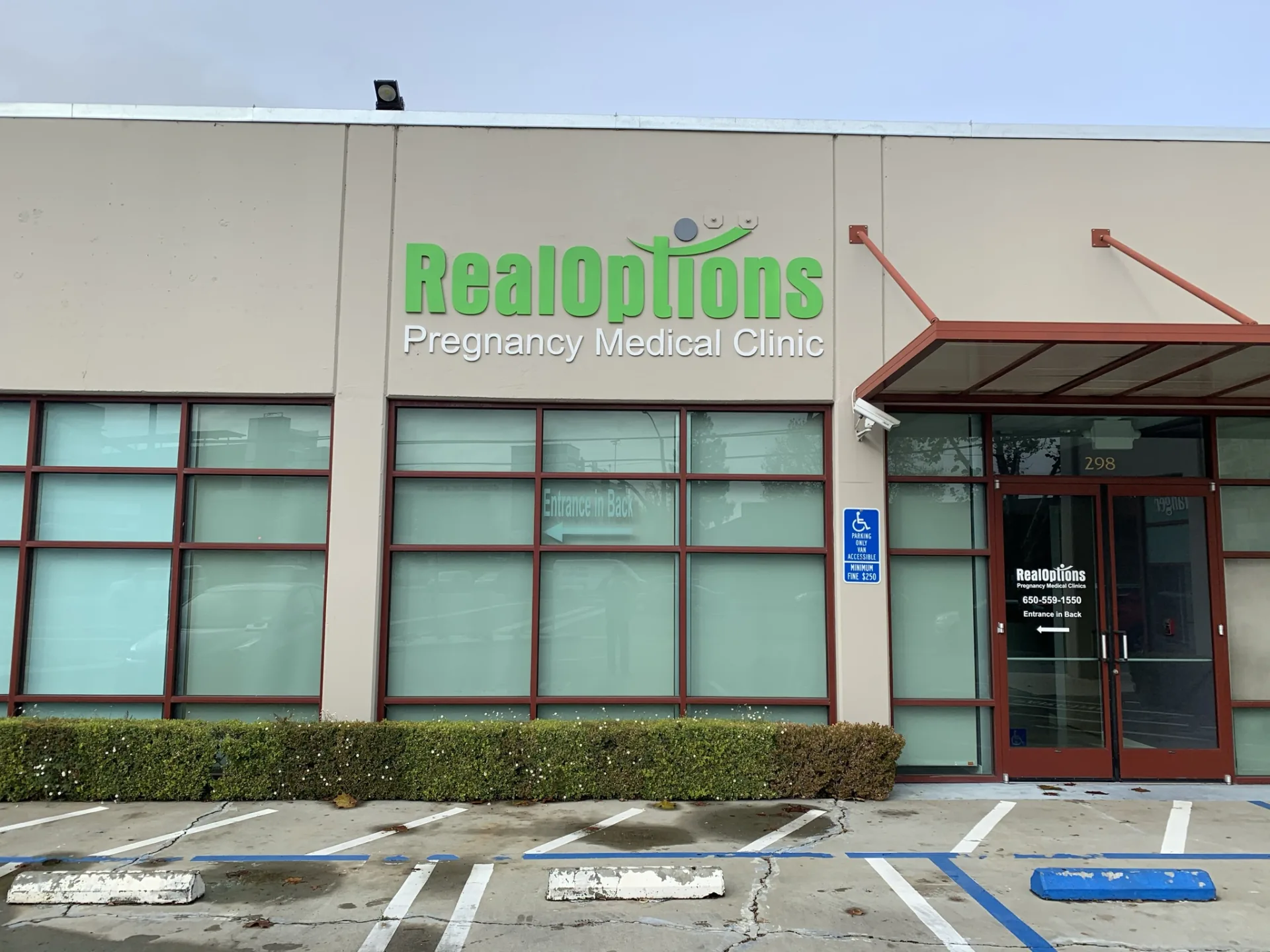 Painted acrylic dimensional letter storefront sign — RealOptions Pregnancy Medical Clinic — Clear Line Signs Mountain View