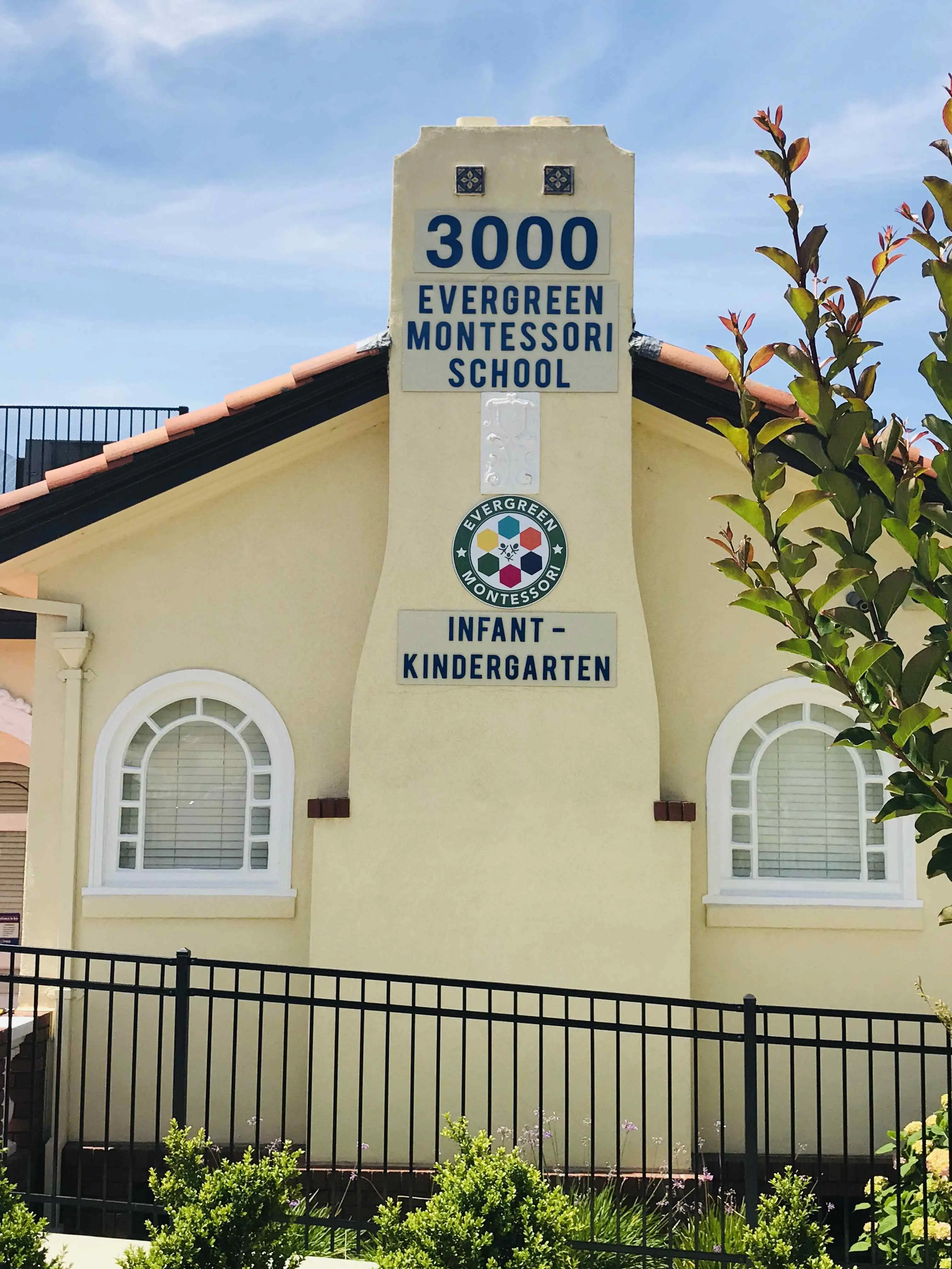 Evergreen Montessori School acrylic dimensional sign panels mounted on building facade San Jose
