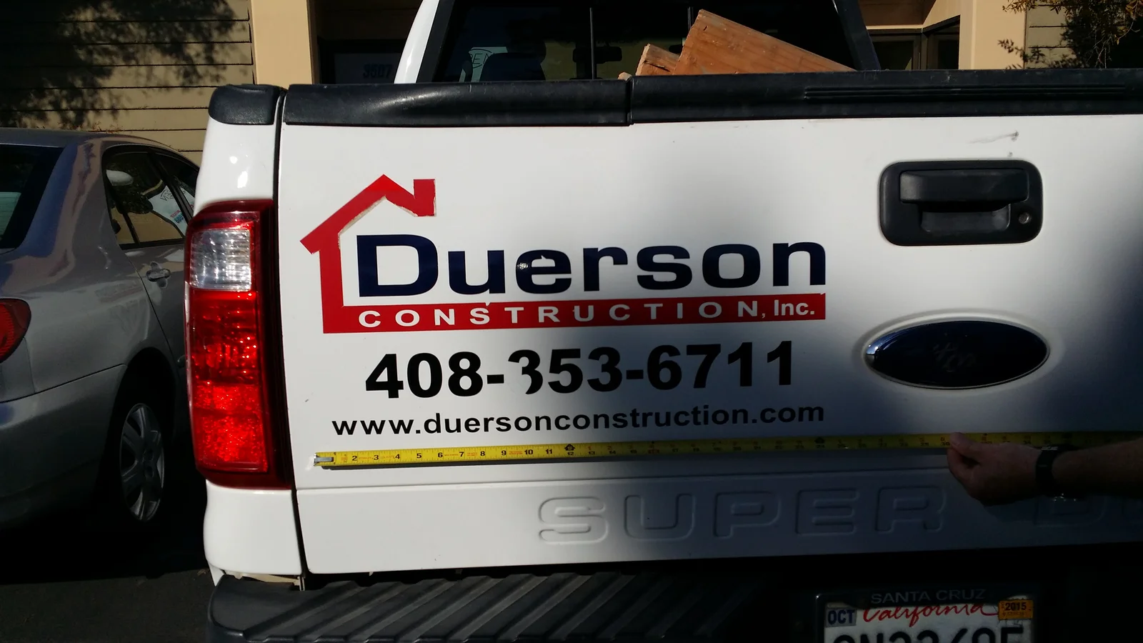 Duerson Construction vinyl decal on Ford F-250 truck tailgate San Jose