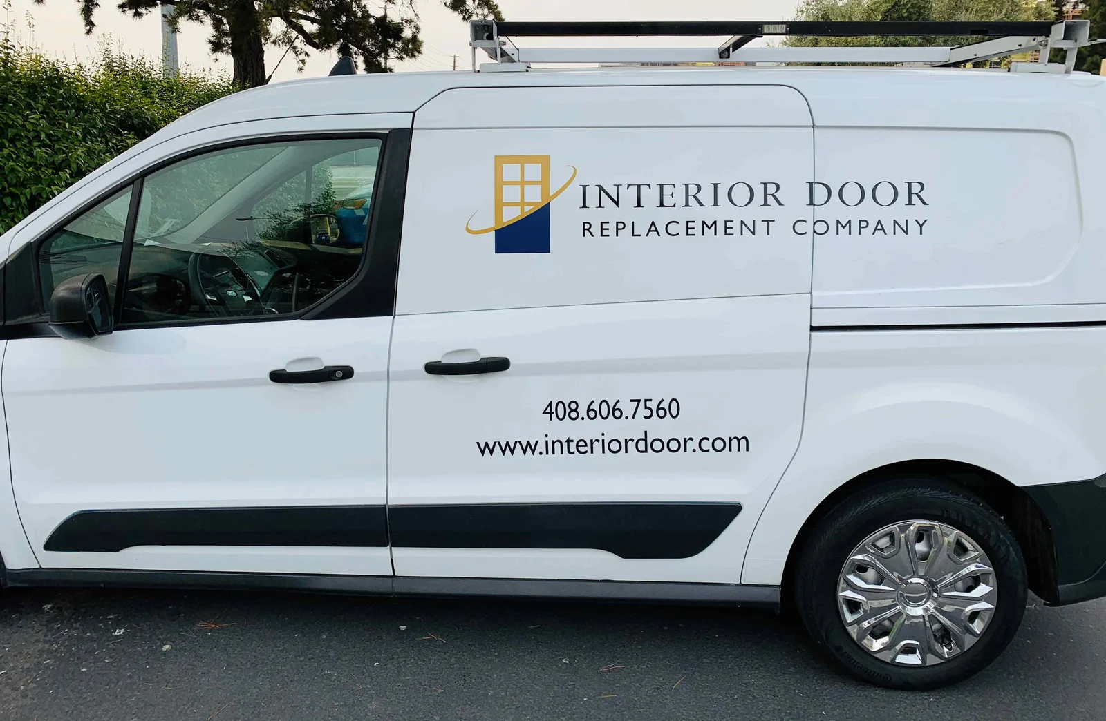 Interior Door Replacement Company vinyl decal on Ford Transit Connect van