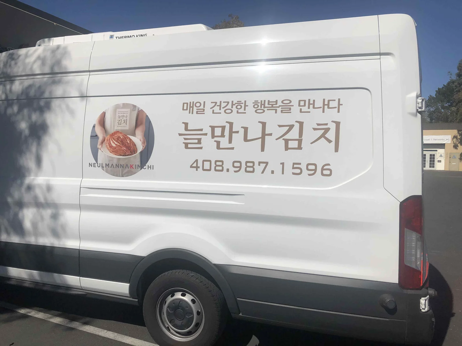 Neulmanna Kimchi vinyl decal on refrigerated delivery van Bay Area