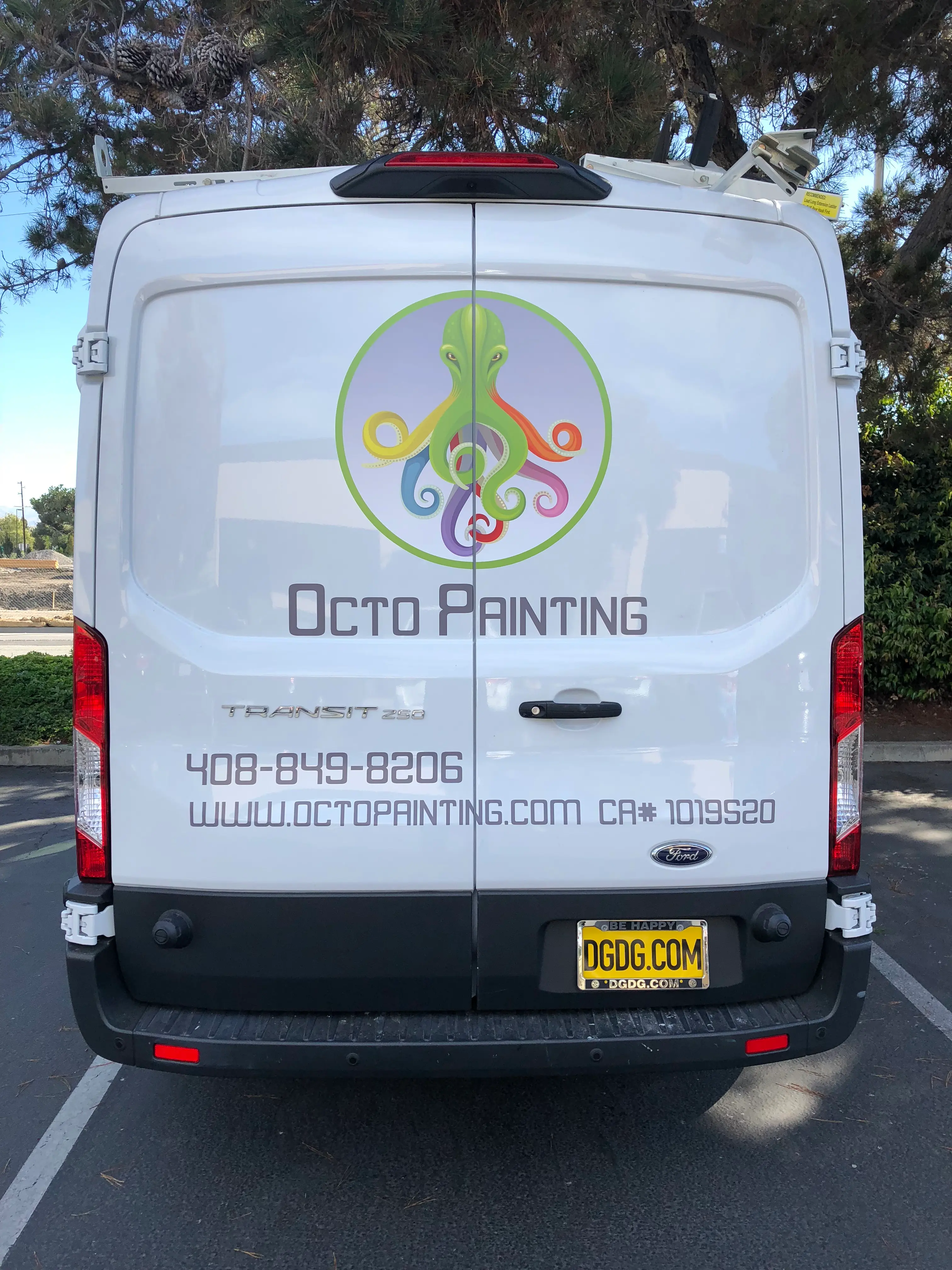 Octo Painting full color vinyl logo on Ford Transit van rear