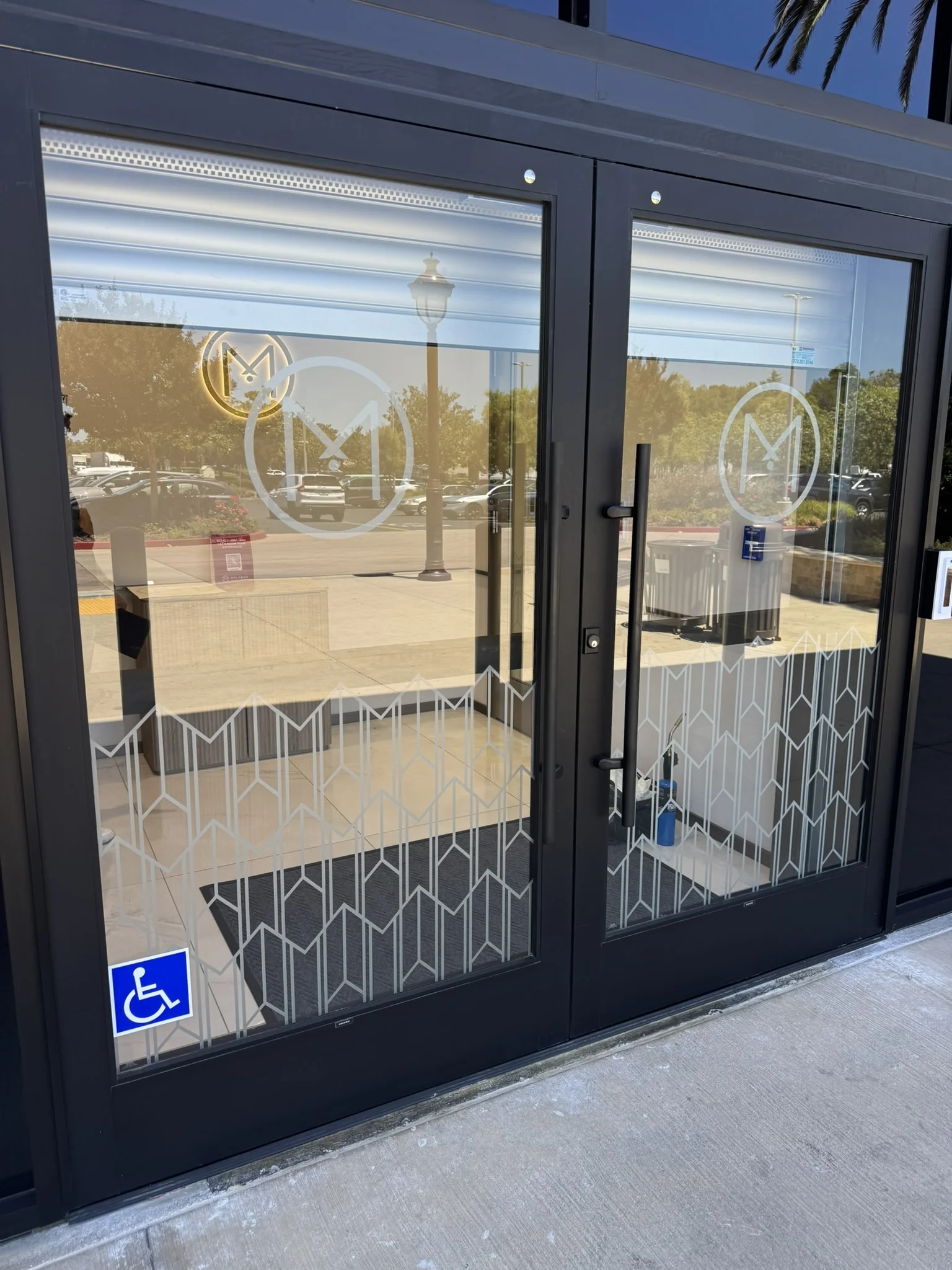 Malabar Gold Diamonds cut vinyl frosted entry doors Art Deco pattern exterior — Clear Line Signs
