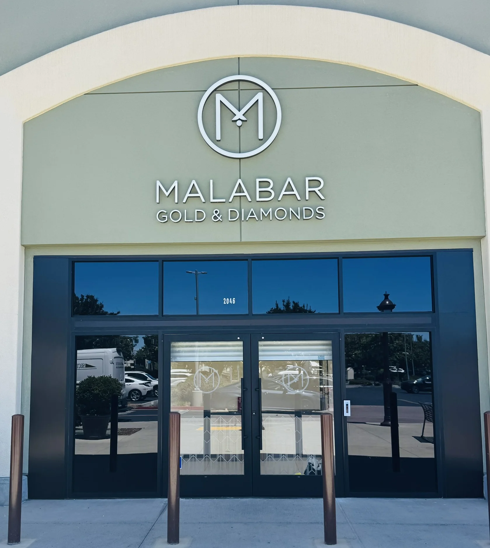 Malabar Gold and Diamonds storefront cut vinyl frosted glass doors Santa Clara — Clear Line Signs